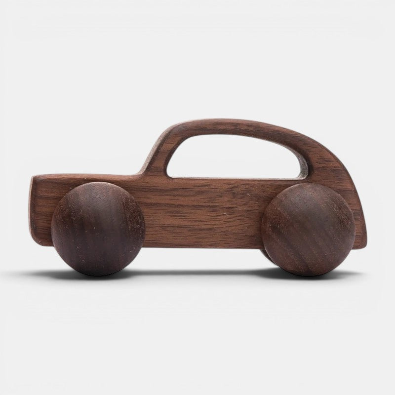 Voiture Montessori en bois naturel, jouet d'éveil pour enfant, design épuré, marque Petit Éveil Montessori.