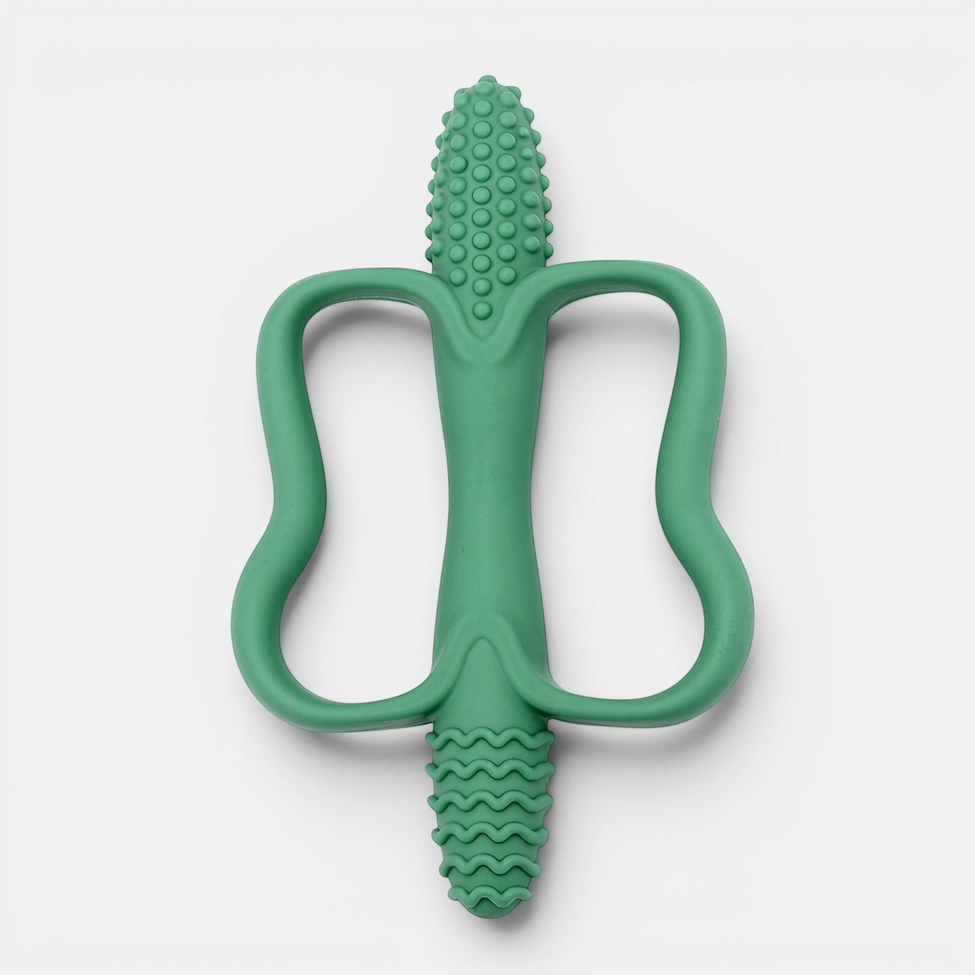 Jouet de dentition Montessori vert en silicone, forme ergonomique pour bébé, texturé pour soulager les gencives.