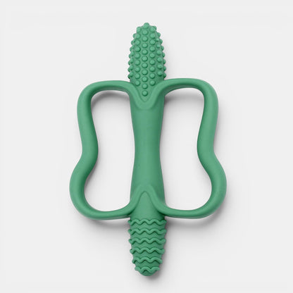 Jouet de dentition Montessori vert en silicone, forme ergonomique pour bébé, texturé pour soulager les gencives.