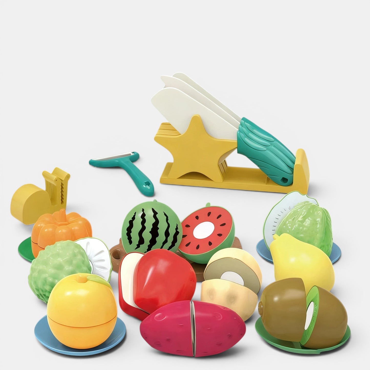 Ensemble de cuisine Montessori Petit Éveil Montessori : fruits et légumes en plastique coupés, avec planche à découper et couteaux.