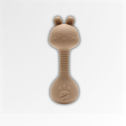Anneau de dentition hochet en silicone beige Petit Éveil Montessori avec tête d'ours et empreinte de patte