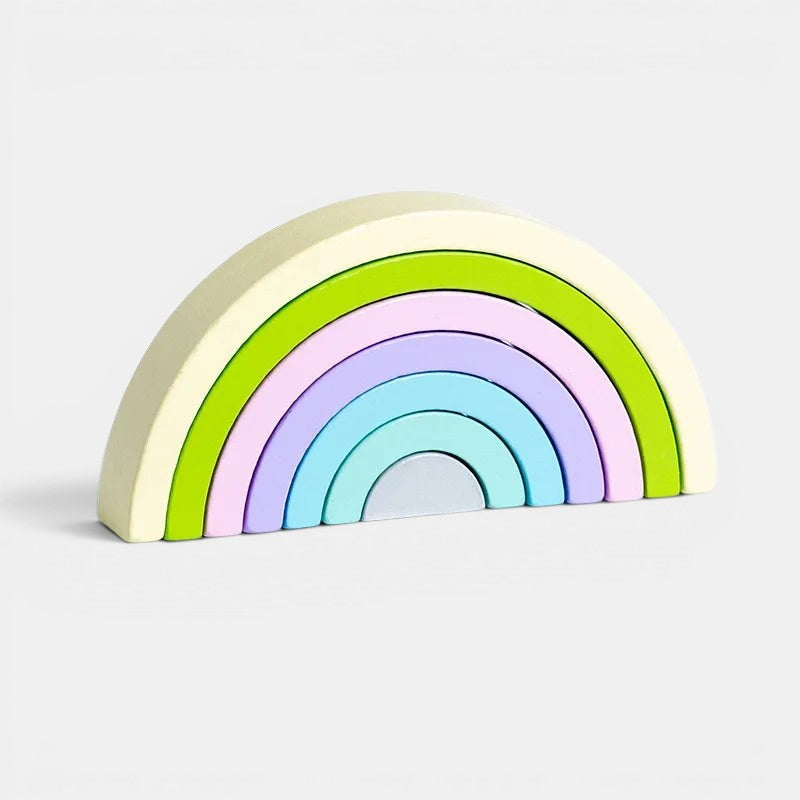 Arc-en-ciel Montessori en bois pastel, jouet empilable pour stimuler la créativité et la motricité.