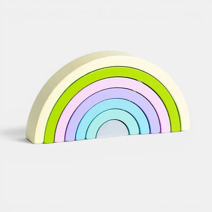 Arc-en-ciel Montessori en bois pastel, jouet empilable pour stimuler la créativité et la motricité.