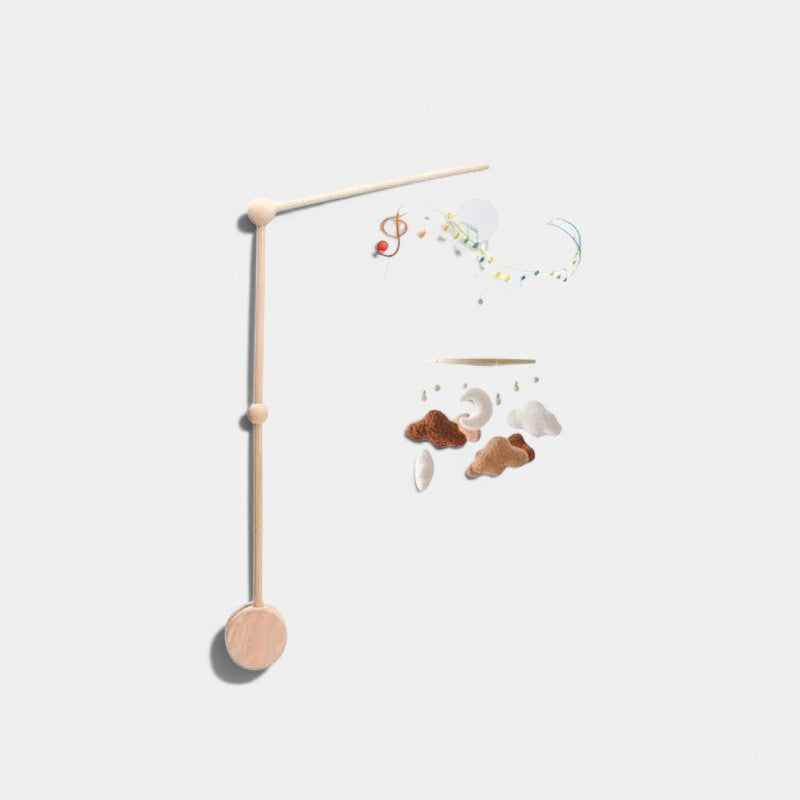 Arche Montessori Bébé en bois avec nuages, lune et notes de musique. Jouets suspendus pour stimuler les sens.