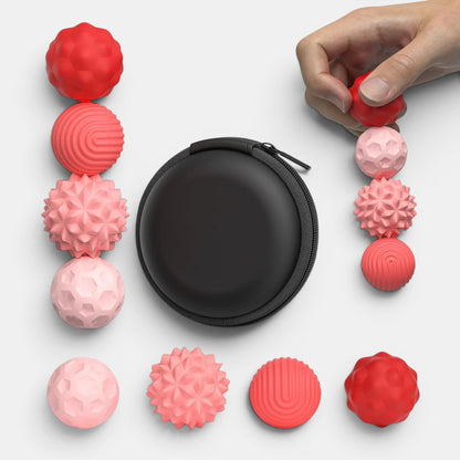 Balle sensorielle magnétique Montessori rose et rouge avec différentes textures, idéale pour la relaxation et la concentration.