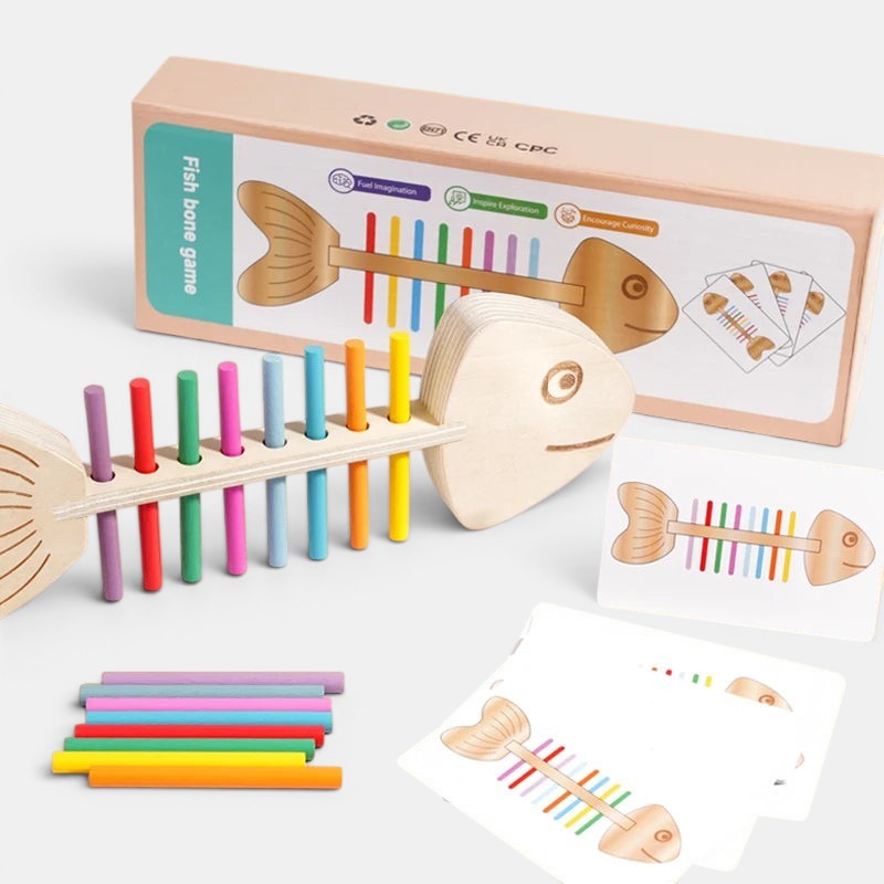 Bâton d'équilibre en bois Petit Éveil Montessori en forme de poisson avec des bâtonnets colorés pour l'apprentissage et la motricité.