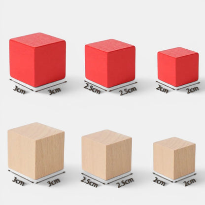Petit Éveil Montessori : Blocs de construction cubiques en bois naturel et rouge, tailles variées, jeu éducatif pour enfants.
