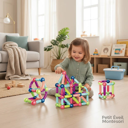 Petit Éveil Montessori : enfant jouant avec des blocs de construction magnétiques multicolores, stimulant la créativité et l'apprentissage.