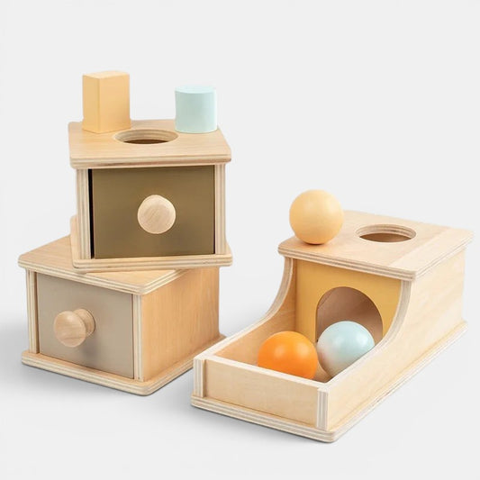 Boîte à monnaie en bois Montessori Petit Éveil Montessori avec blocs et balles pour développer la motricité.
