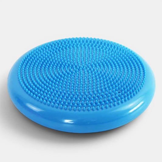 Petit Éveil Montessori coussin d'équilibre bleu texturé pour le développement moteur et sensoriel des enfants.