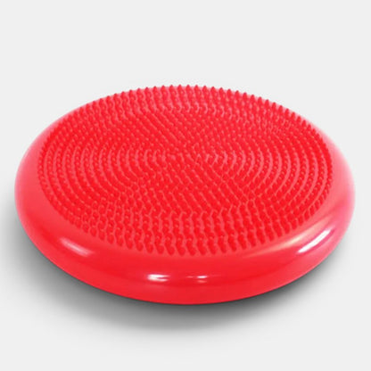 Petit Éveil Montessori - Coussin d'équilibre rouge texturé pour enfants, favorise la motricité et la coordination.