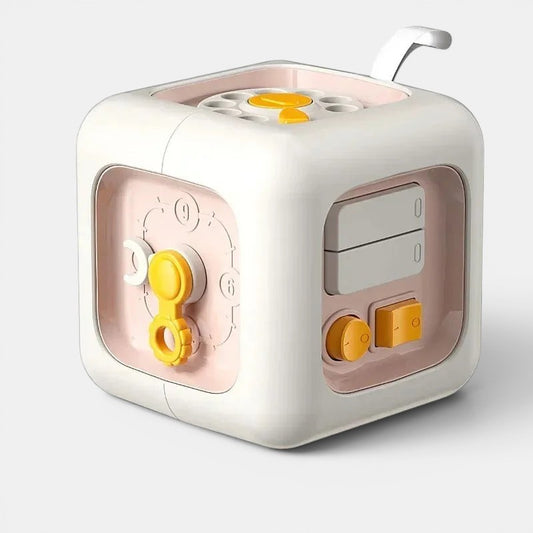 Cube d'éveil Petit Éveil Montessori 6 en 1 rose et blanc pour le développement de la motricité fine des bébés