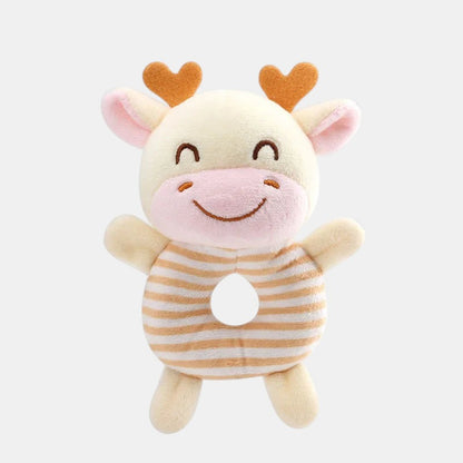 Petit Éveil Montessori hochet en peluche vache rayé, jouet d'éveil doux pour bébé, couleurs crème et orange.