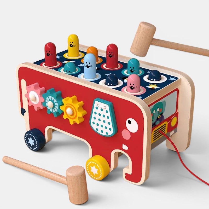 Jeu en bois Petit Éveil Montessori, éléphant rouge avec engrenages, marteaux et personnages à marteler. Idéal pour motricité.