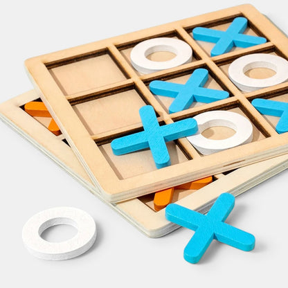 Jeu de morpion en bois Petit Éveil Montessori, pièces bleues et blanches, pour développer la logique et la motricité.