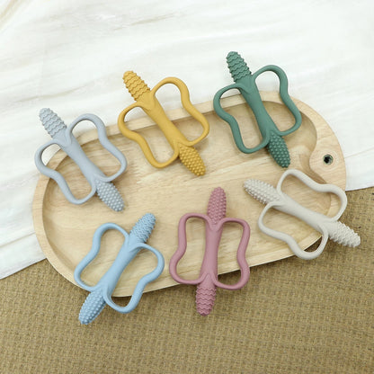 Lot de 6 jouets de dentition Montessori en silicone souple en forme de maïs, couleurs pastel, pour bébé.
