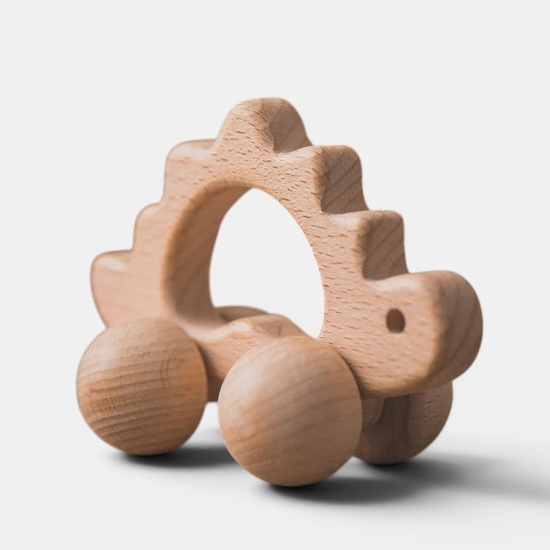 Petit Éveil Montessori - Jouet à mordiller en bois naturel en forme de dinosaure avec roues