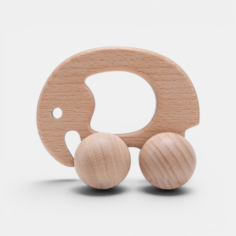 Petit Éveil Montessori - Jouet éléphant en bois naturel avec deux roues, idéal pour le développement de la motricité.