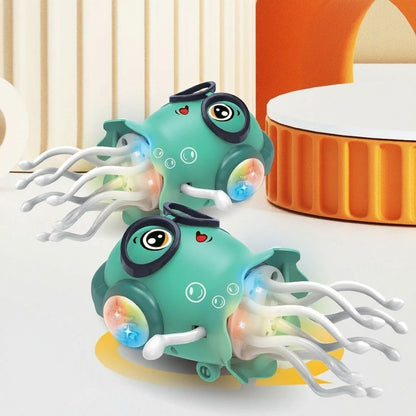 Jouet méduse dansante Petit Éveil Montessori, vert menthe, avec lumières LED et tentacules mobiles, idéal pour l'éveil sensoriel.