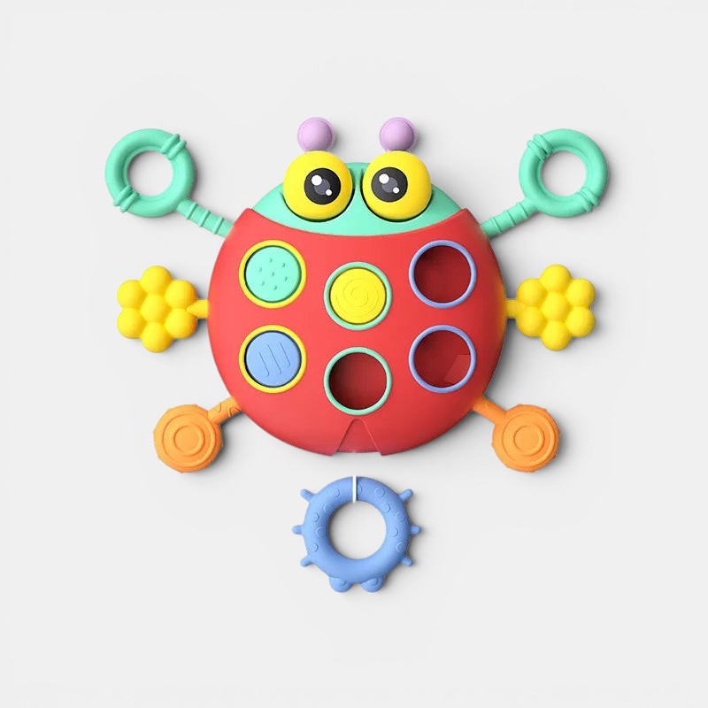 Jouet sensoriel Petit Éveil Montessori en forme de coccinelle colorée pour développer la motricité fine des bébés.