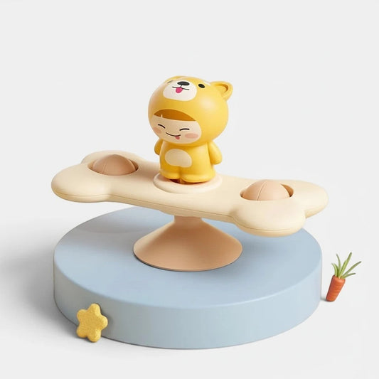 Petit Éveil Montessori - Jouet spinner ventouse sensoriel jaune en forme de personnage animal pour bébé, idéal pour la motricité.