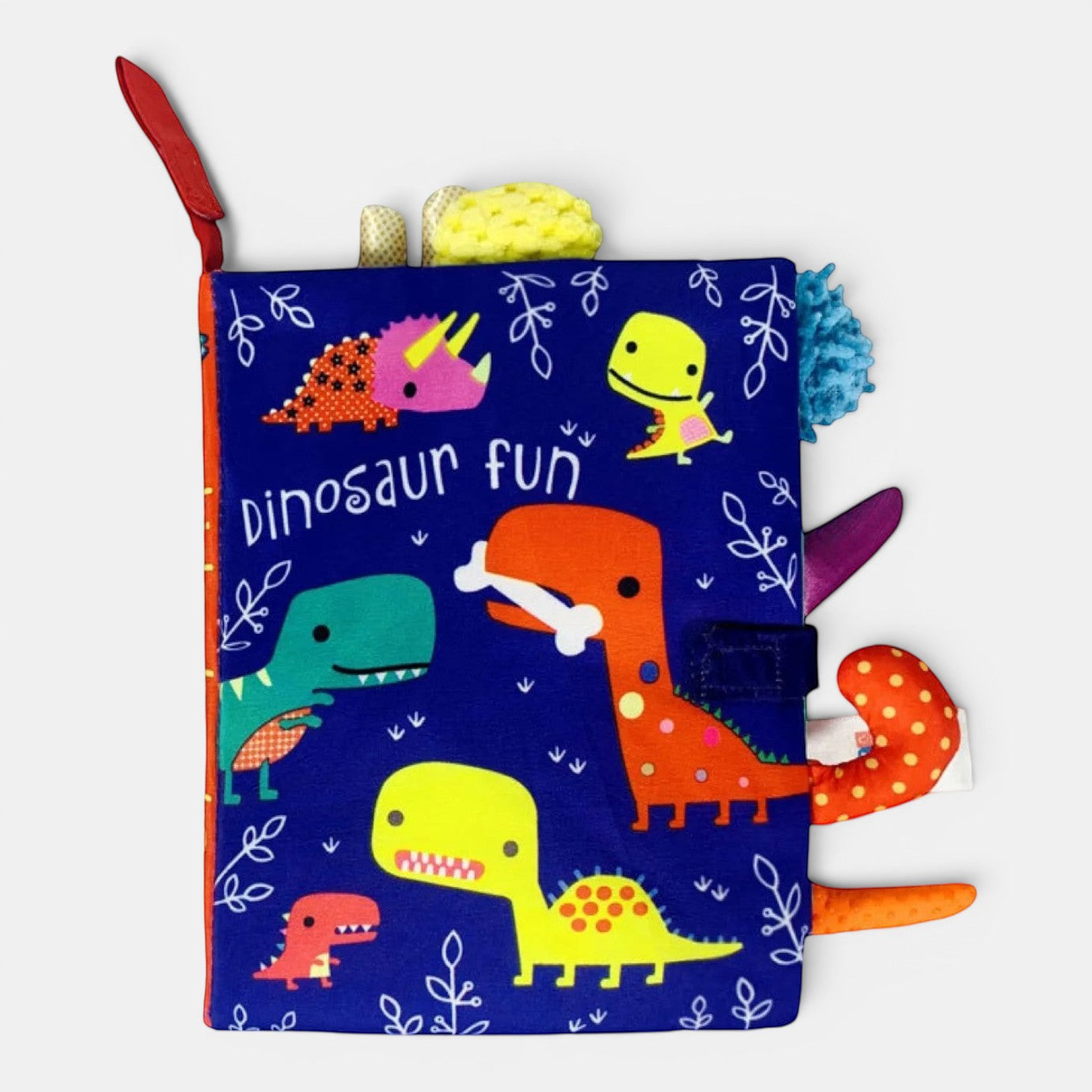 Livre d'éveil Petit Éveil Montessori bleu avec des dinosaures colorés et des textures variées pour bébé.
