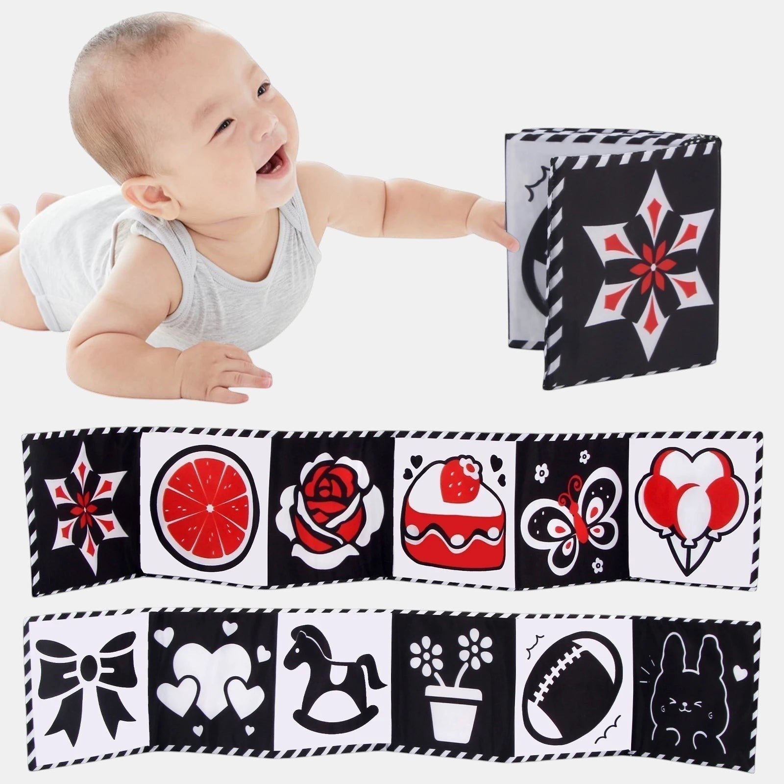 Livre sensoriel en tissu noir et blanc avec touches de rouge, motifs variés (cœur, fusées, chiffres, chat) pour bébé. Marque Petit Éveil Montessori.