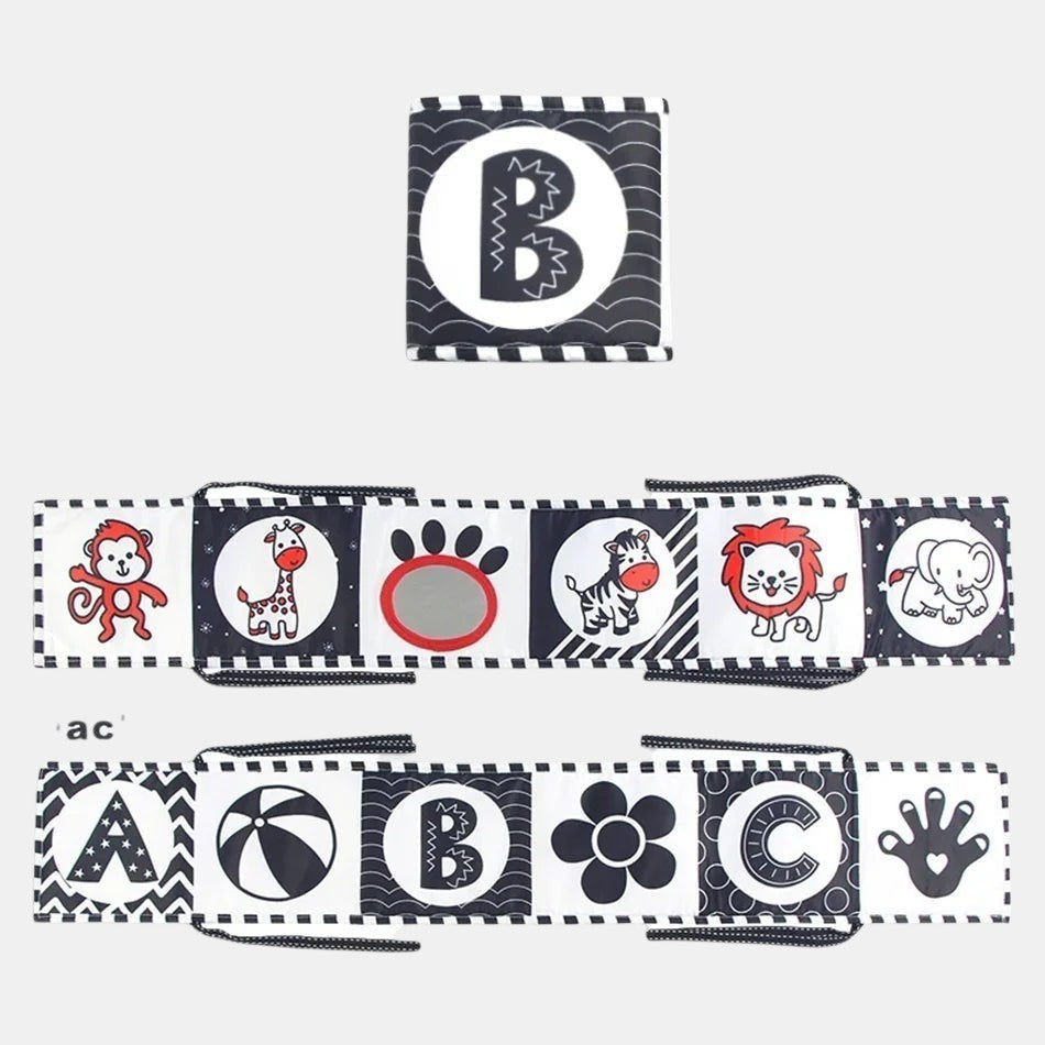 Livre sensoriel en tissu noir et blanc Petit Éveil Montessori avec des animaux et des lettres pour bébé.