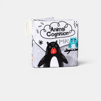 Livre en tissu Petit Éveil Montessori avec un ours noir et un hibou bleu, texte "Animal Cognition". Idéal pour l'éveil sensoriel.