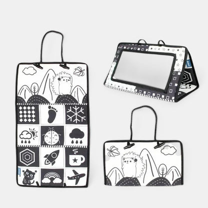 Miroir Montessori Petit Éveil Montessori noir et blanc avec motifs sensoriels et un hérisson.