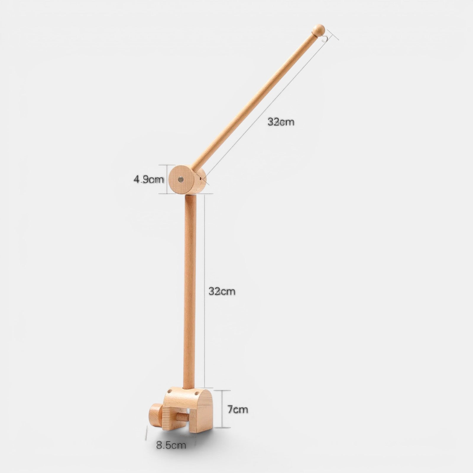 Petit Éveil Montessori mobile en bois naturel pour berceau, support pour jouets d'éveil, design minimaliste.