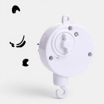 Petit Éveil Montessori - Mécanisme blanc pour mobile de berceau, design simple et fonctionnel.