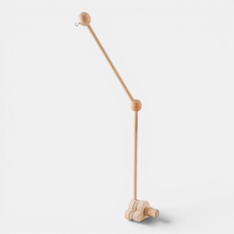 Petit Éveil Montessori mobile en bois naturel pour berceau, design minimaliste, idéal pour l'éveil sensoriel.