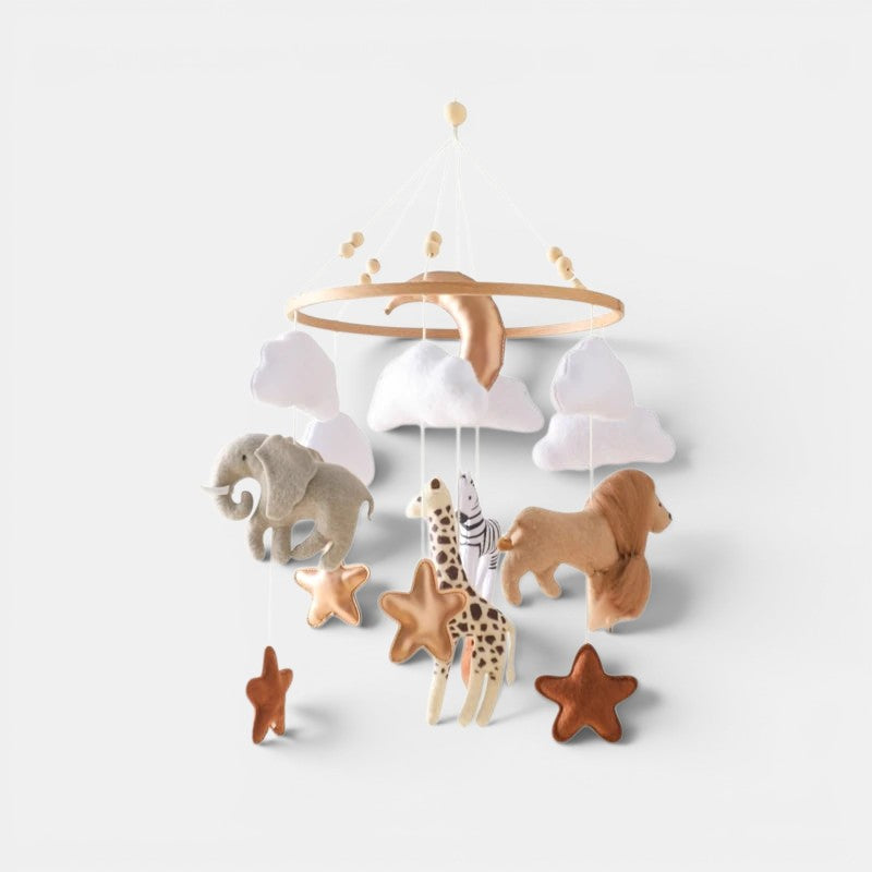 Mobile de lit Petit Éveil Montessori avec éléphant, girafe, zèbre, lion, nuages et étoiles en feutrine.