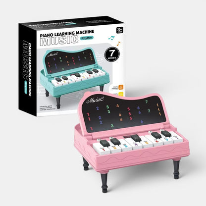 Petit Éveil Montessori, jouet piano d'apprentissage musical rose avec 7 modes et touches colorées pour l'éveil des enfants.