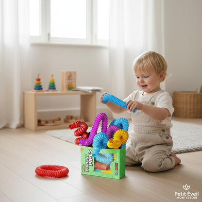 Petit Éveil Montessori : lot de 4 tubes sensoriels Pop Tube multicolores (rouge, violet, bleu, jaune) pour enfants.
