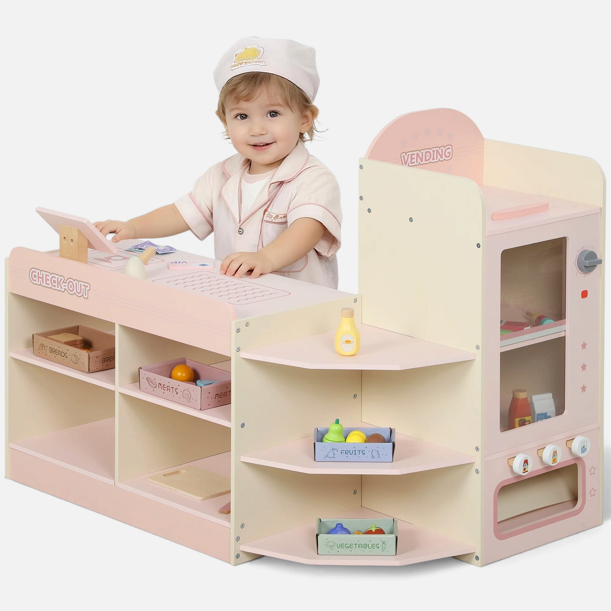 Enfant jouant avec le supermarché en bois Petit Éveil Montessori rose et beige avec caisse et accessoires