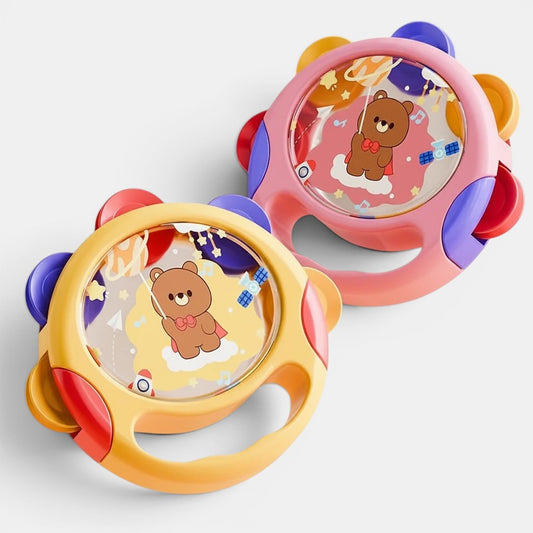 Petit Éveil Montessori : tambourins colorés avec motifs d'oursons, fusées et planètes, idéaux pour l'éveil musical des tout-petits.