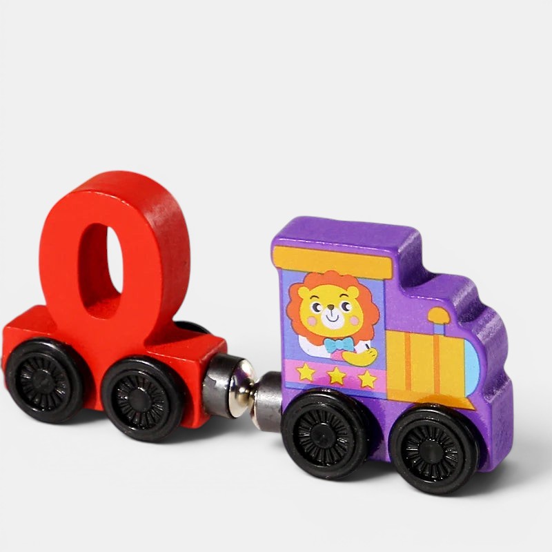 Petit Éveil Montessori train magnétique en bois avec le chiffre 0 rouge et une locomotive violette décorée d'un lion.