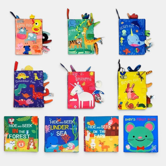 Livre d'éveil en tissu Petit Éveil Montessori avec des licornes colorées, idéal pour les bébés.