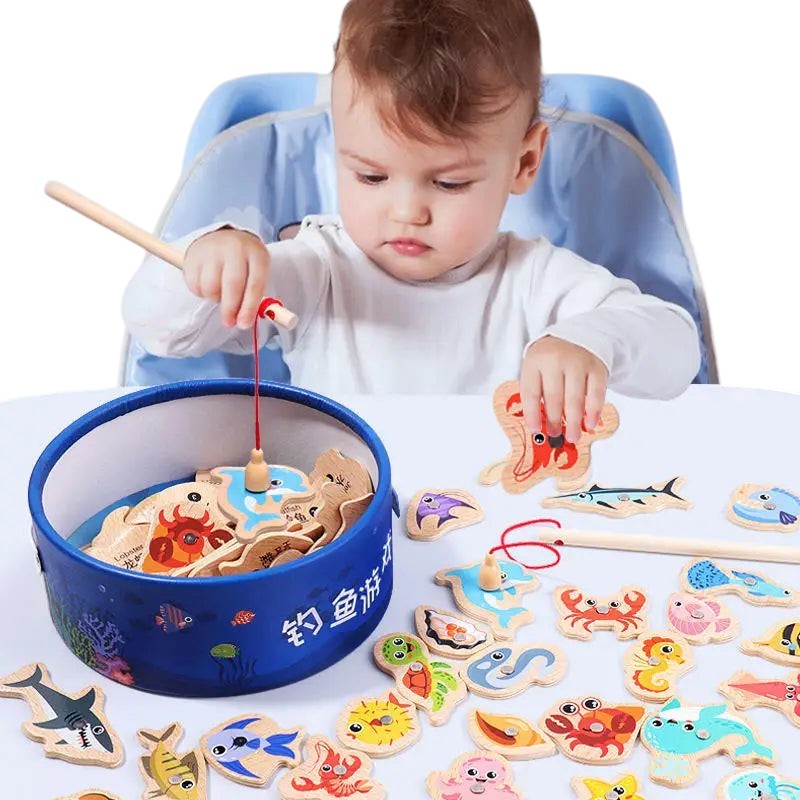 Petit Éveil Montessori : jeu de pêche magnétique en bois avec 12 animaux marins et 2 cannes. Idéal pour la motricité.